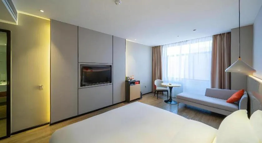 Bed in Borrman Hotel Yongzhou High Speed Railway Station