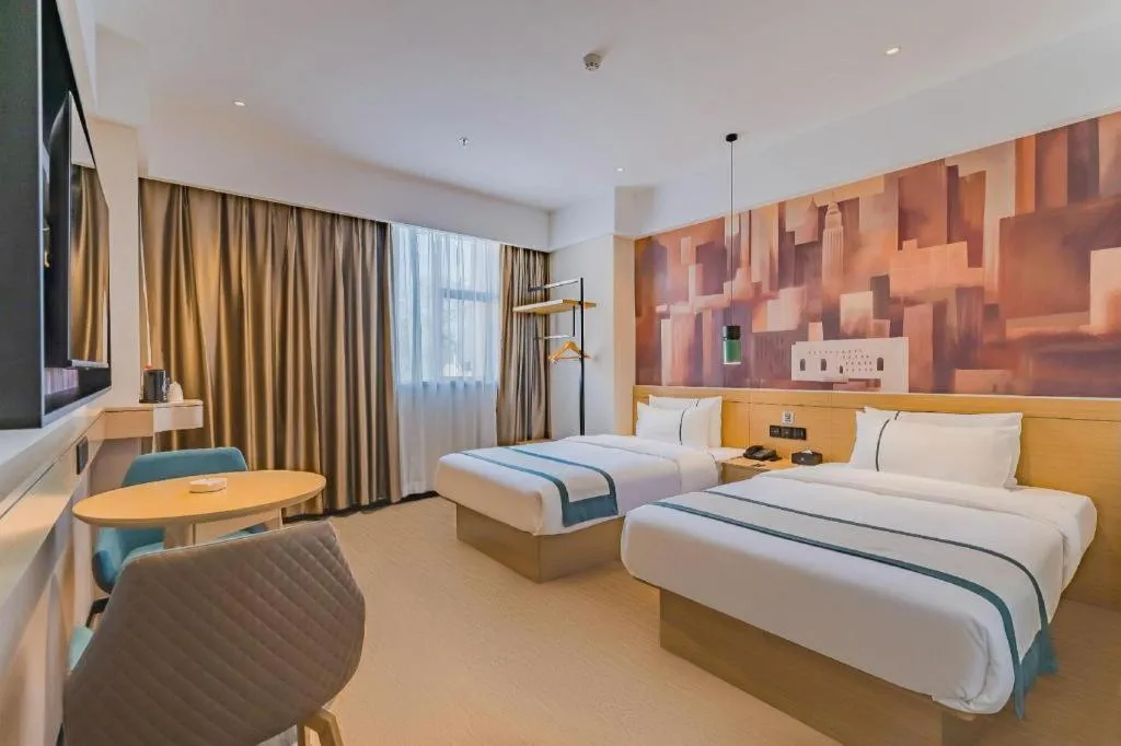 Bed in City Comfort Inn Hotel Dongguan Humen Pedestrian Street