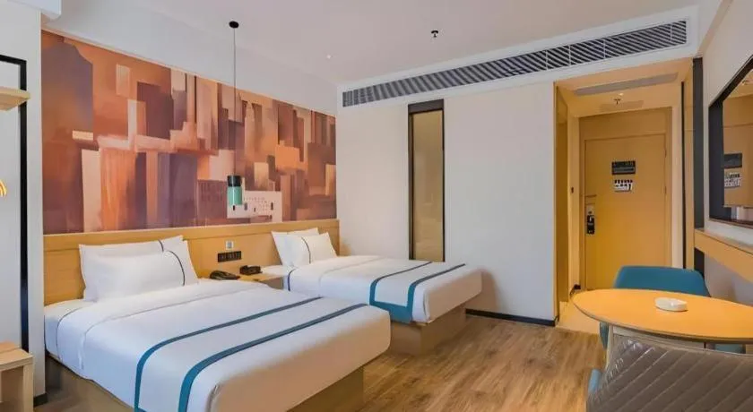 Bed in City Comfort Inn Hotel Dongguan Humen Pedestrian Street