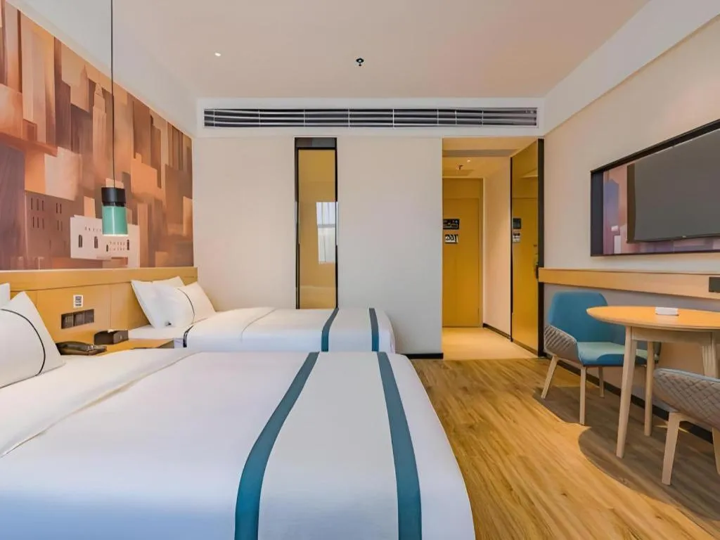 Bed in City Comfort Inn Hotel Dongguan Humen Pedestrian Street