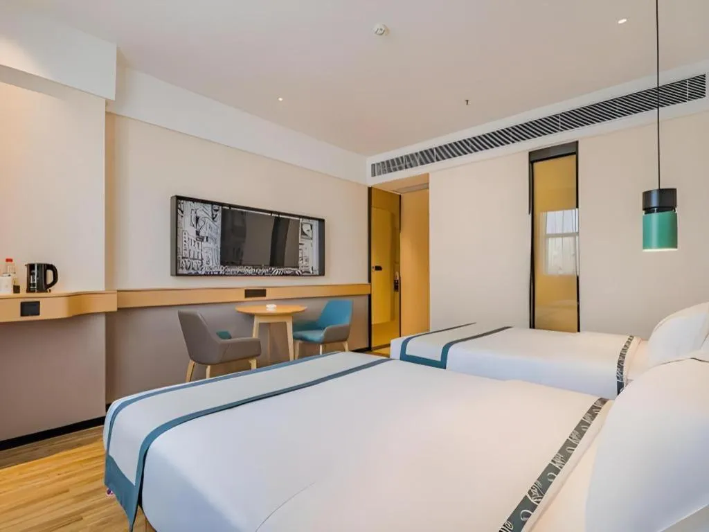 Bed in City Comfort Inn Hotel Dongguan Humen Pedestrian Street