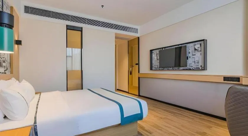 Bed in City Comfort Inn Hotel Dongguan Humen Pedestrian Street
