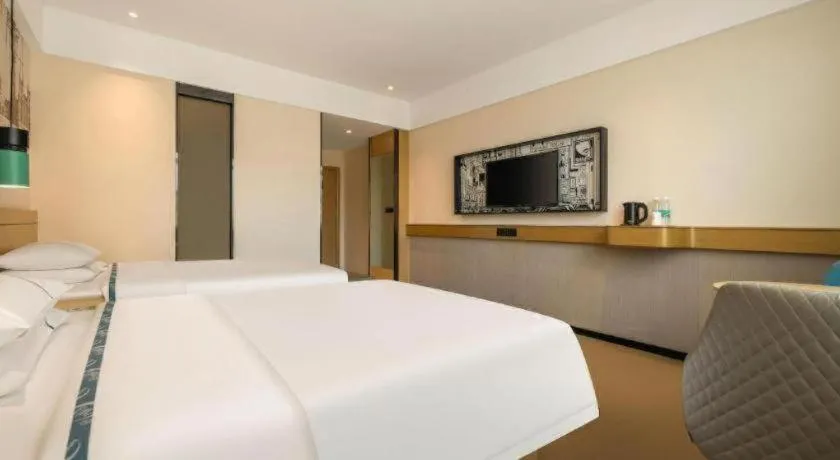 Bed in City Comfort Inn Fangchenggang Government Affairs Center