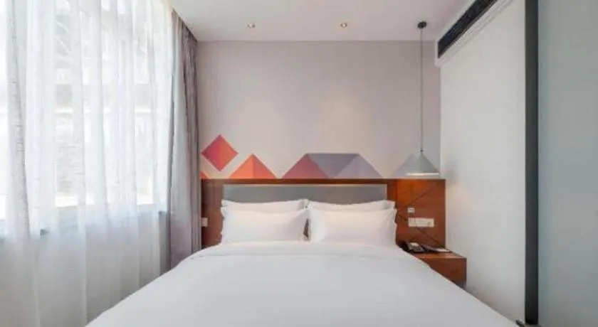 Bed in Borrman Hotel Hezhou High Speed Railway Station Guangming Avenue