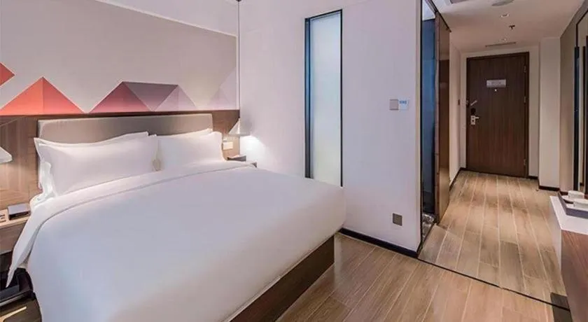 Bed in Borrman Hotel Hezhou High Speed Railway Station Guangming Avenue