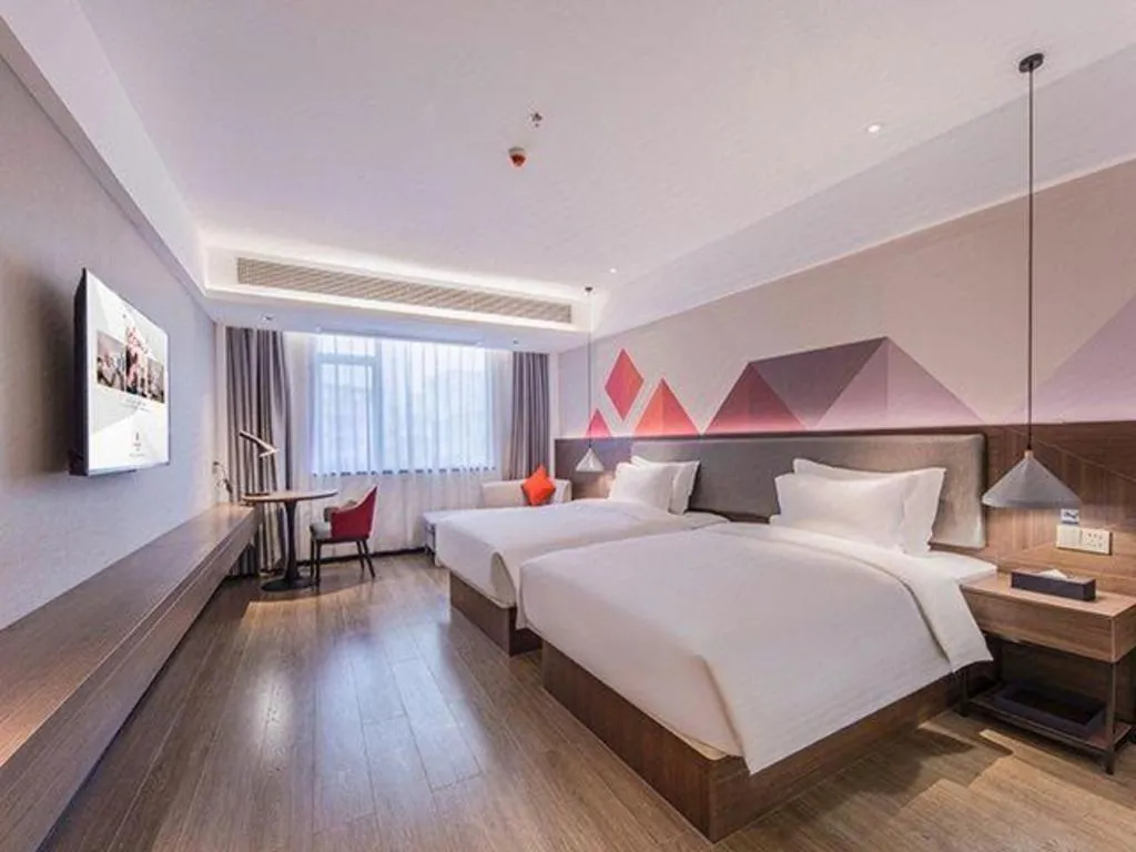 Bed in Borrman Hotel Hezhou High Speed Railway Station Guangming Avenue