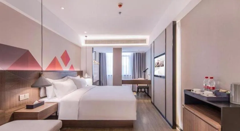 Bed in Borrman Hotel Hezhou High Speed Railway Station Guangming Avenue
