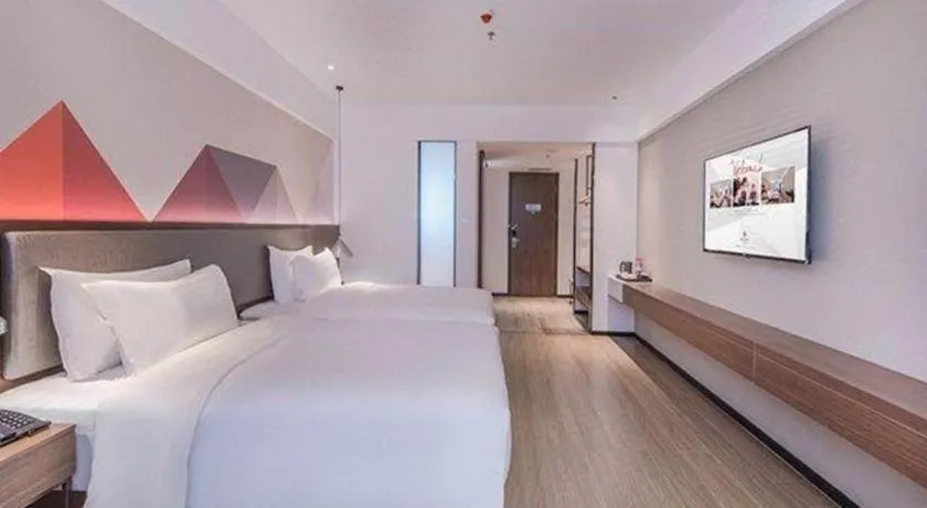 Bed in Borrman Hotel Hezhou High Speed Railway Station Guangming Avenue