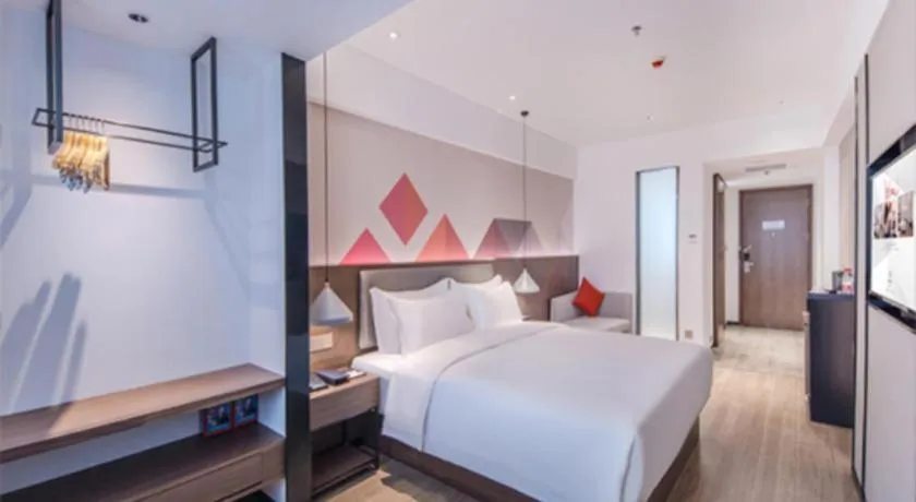 Bed in Borrman Hotel Hezhou High Speed Railway Station Guangming Avenue