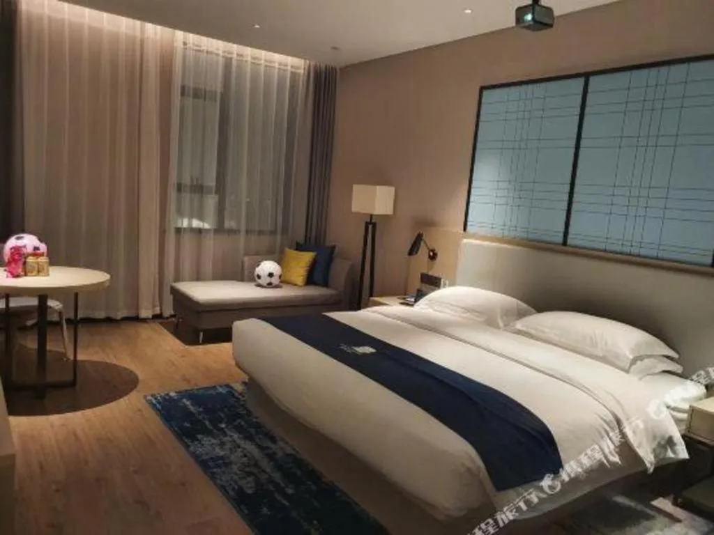 Bed in Echarm Hotel Fangchenggang Qisha