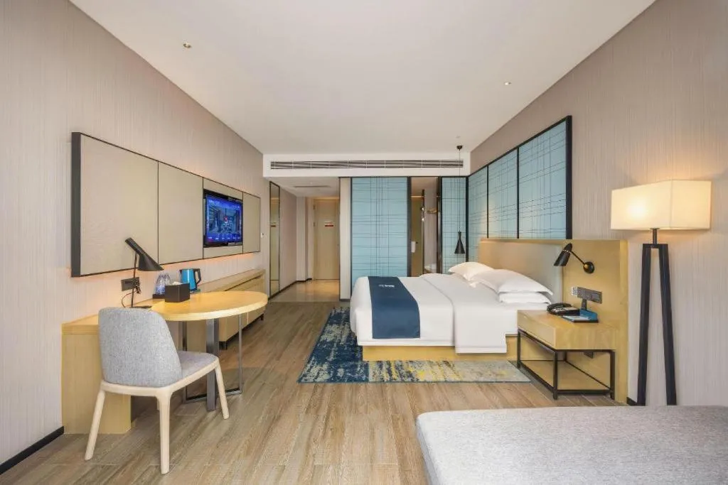 Bed in Echarm Hotel Fangchenggang Qisha