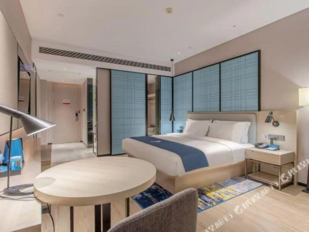 Bed in Echarm Hotel Fangchenggang Qisha