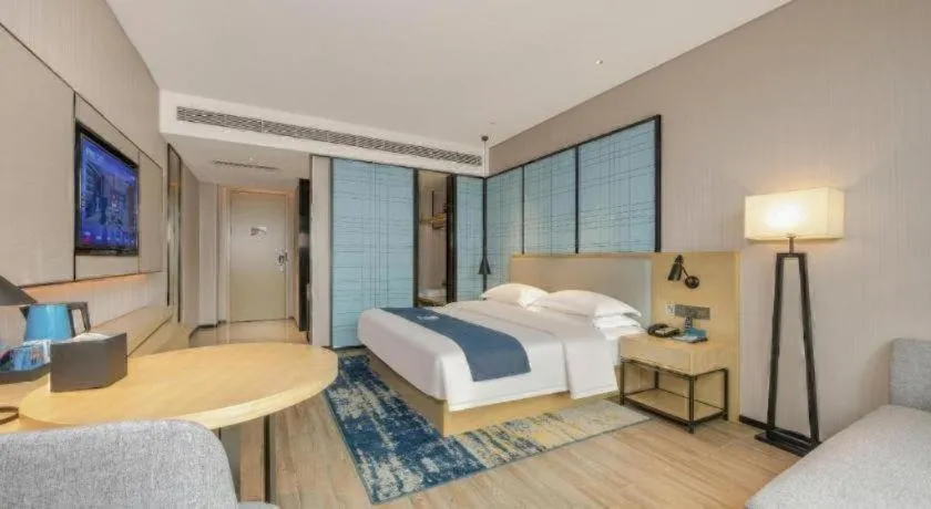 Bed in Echarm Hotel Fangchenggang Qisha