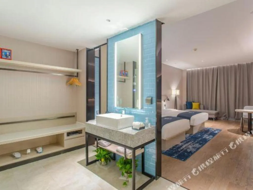 Bed in Echarm Hotel Fangchenggang Qisha