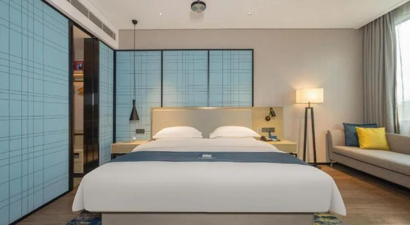 Bed in Echarm Hotel Fangchenggang Qisha