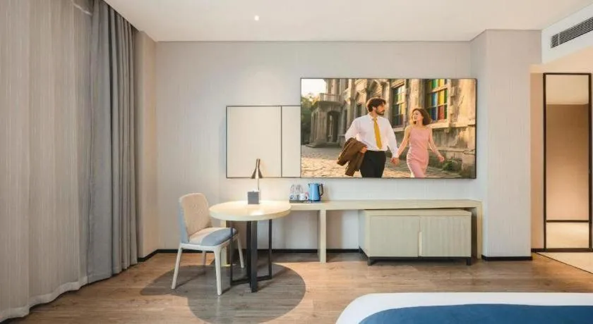 Bed in Echarm Hotel Fangchenggang Qisha