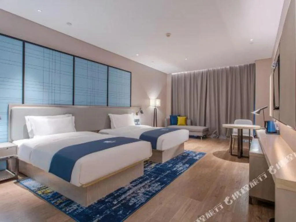 Bed in Echarm Hotel Fangchenggang Qisha