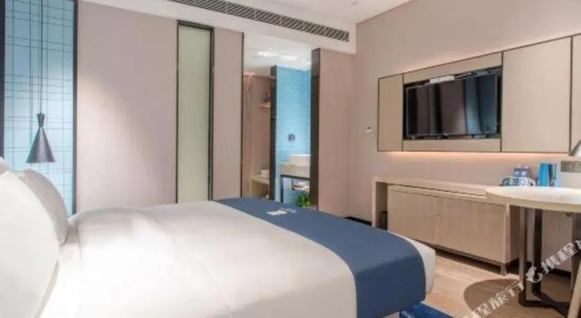 Bed in Echarm Hotel Fangchenggang Qisha