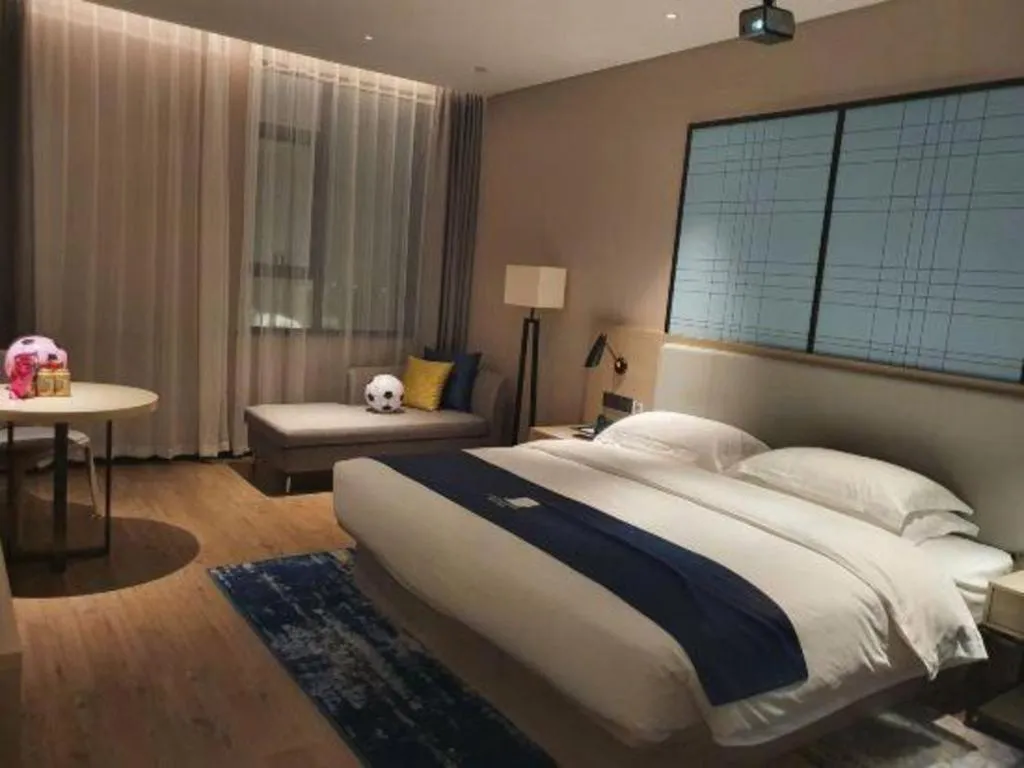 Bed in Echarm Hotel Fangchenggang Qisha