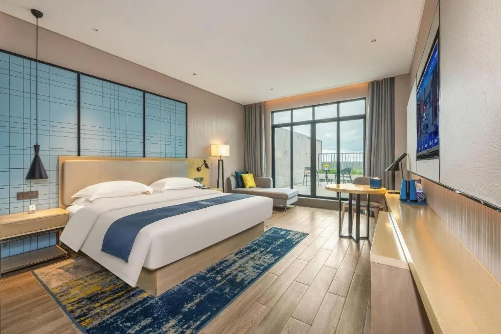 Bed in Echarm Hotel Fangchenggang Qisha