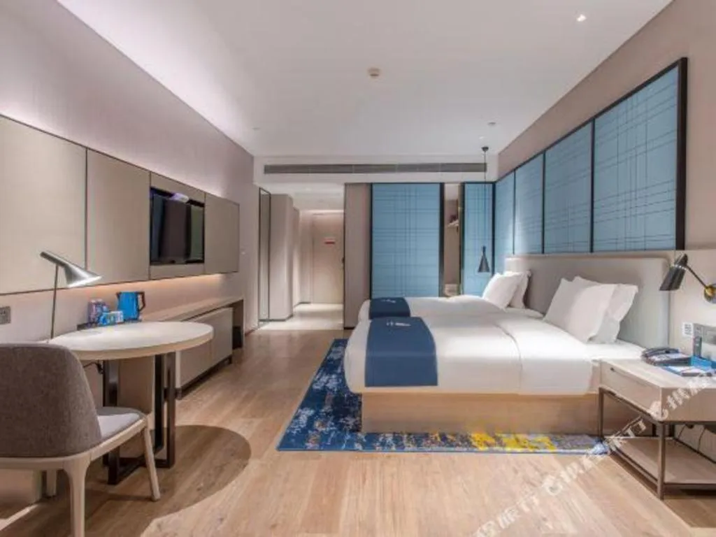 Bed in Echarm Hotel Fangchenggang Qisha