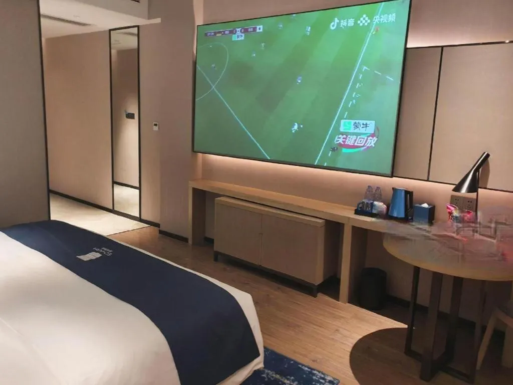 Bed in Echarm Hotel Fangchenggang Qisha