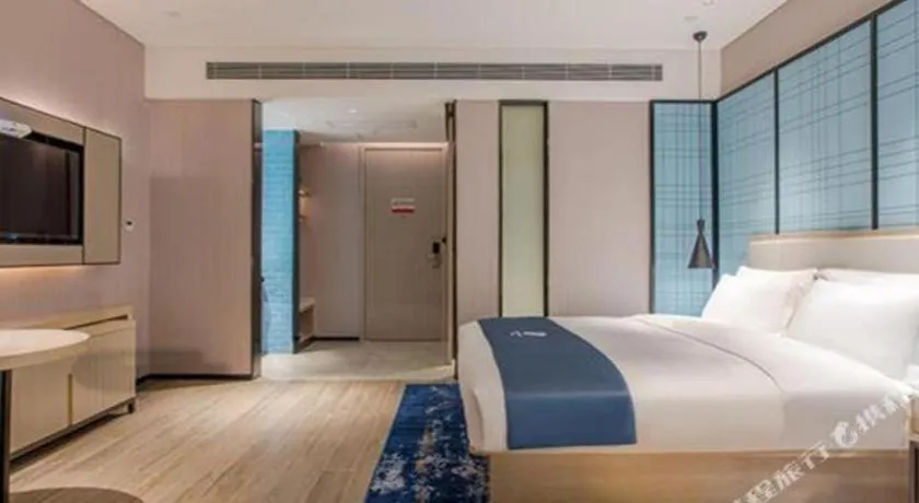 Bed in Echarm Hotel Fangchenggang Qisha