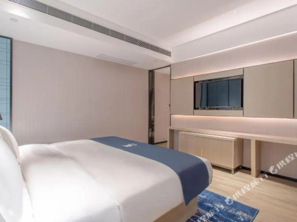 Bed in Echarm Hotel Fangchenggang Qisha