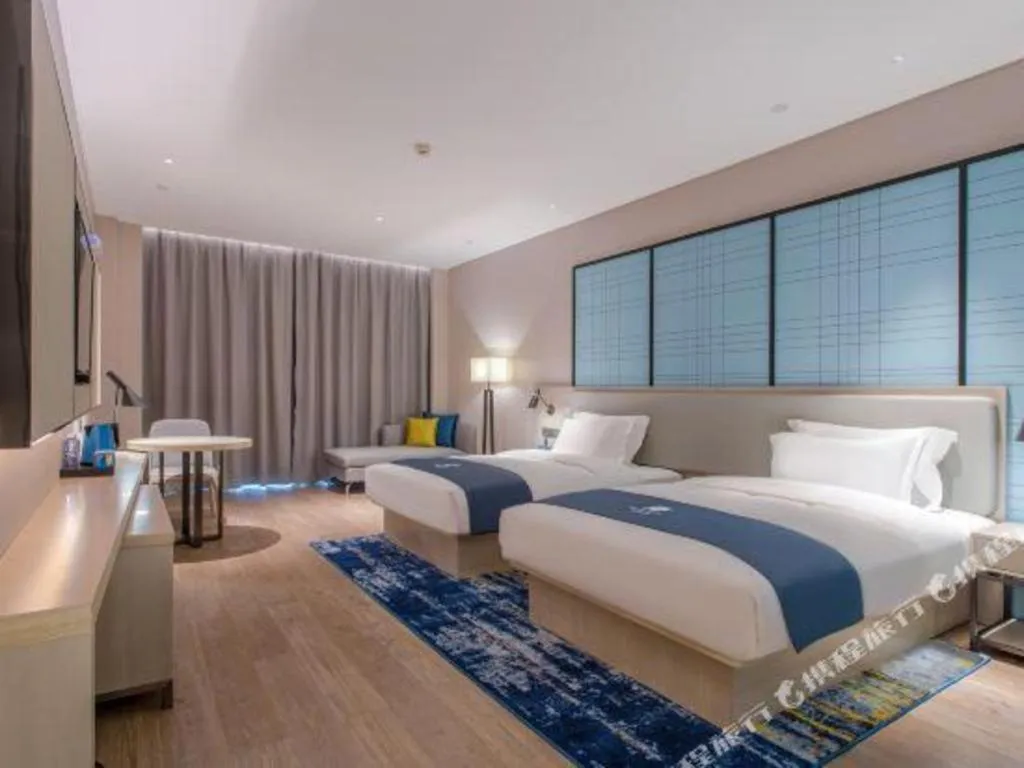 Bed in Echarm Hotel Fangchenggang Qisha