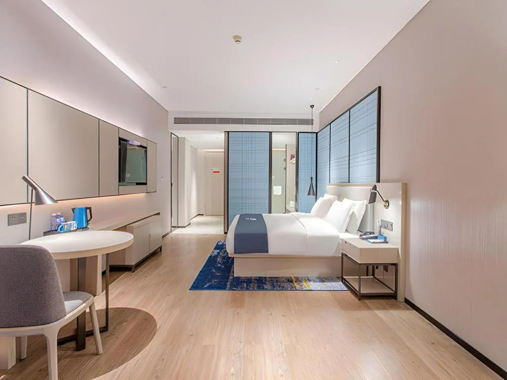 Bed in Echarm Hotel Fangchenggang Qisha