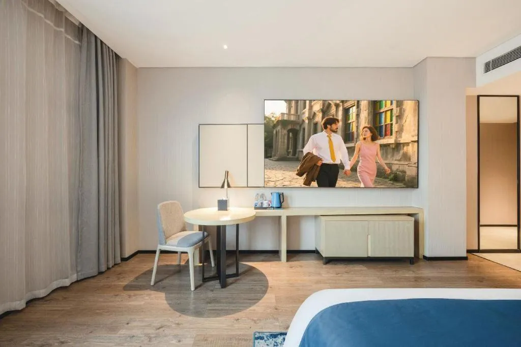 Bed in Echarm Hotel Fangchenggang Qisha