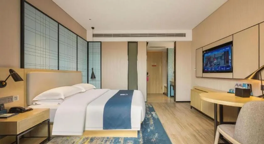 Bed in Echarm Hotel Fangchenggang Qisha