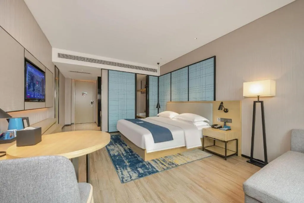 Bed in Echarm Hotel Fangchenggang Qisha