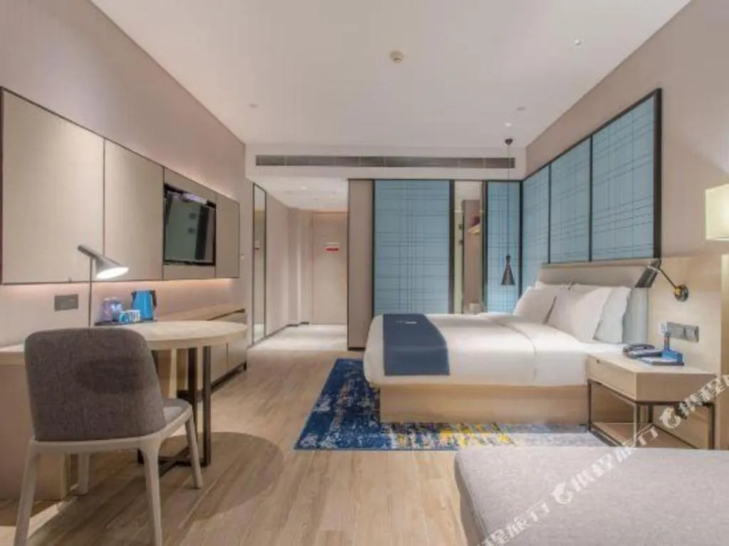 Bed in Echarm Hotel Fangchenggang Qisha