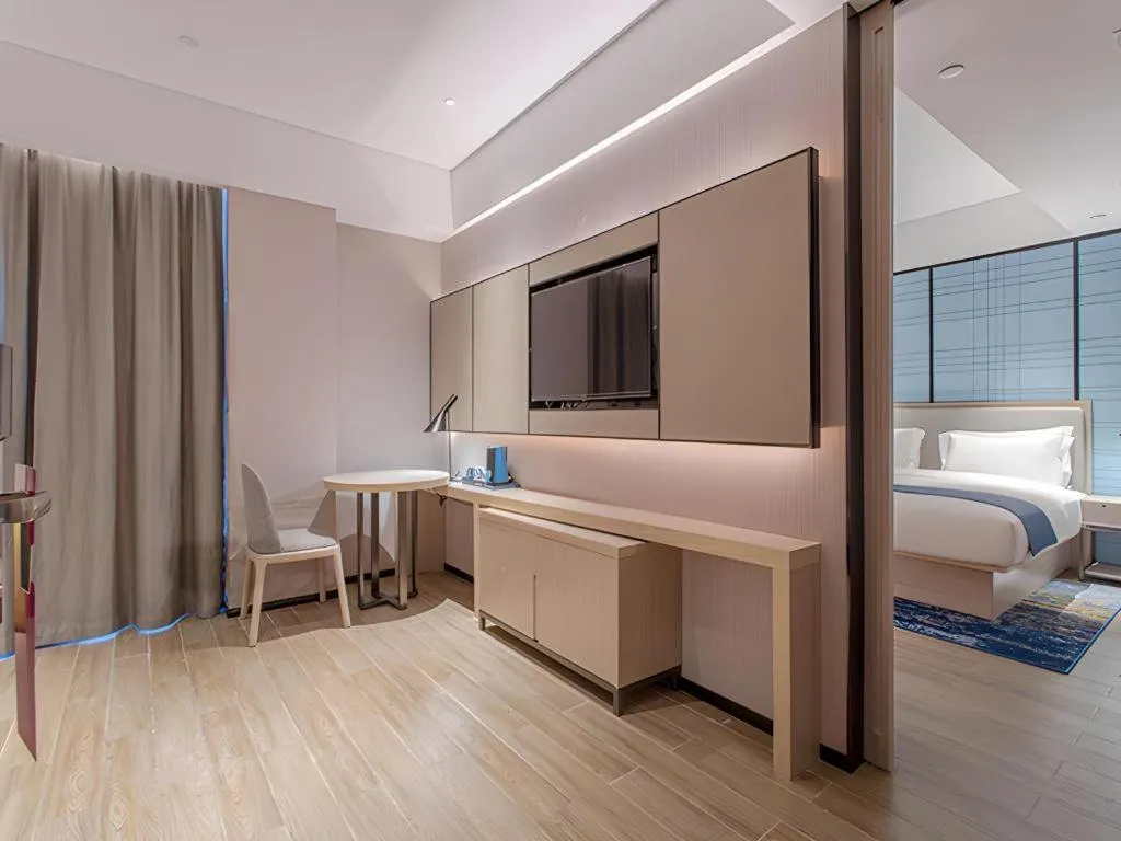 Bed in Echarm Hotel Fangchenggang Qisha