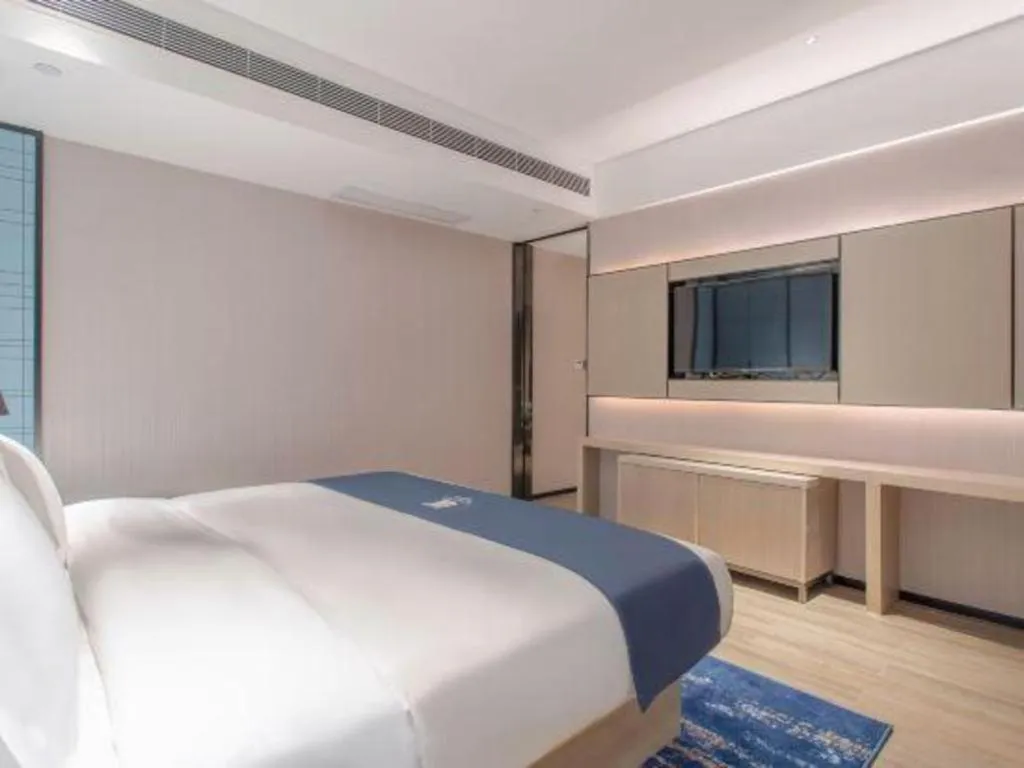 Bed in Echarm Hotel Fangchenggang Qisha