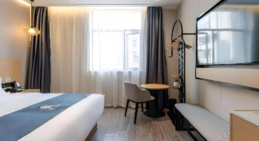 Bed in Echarm Hotel Shanghai North Bund Tilanqiao Metro Station