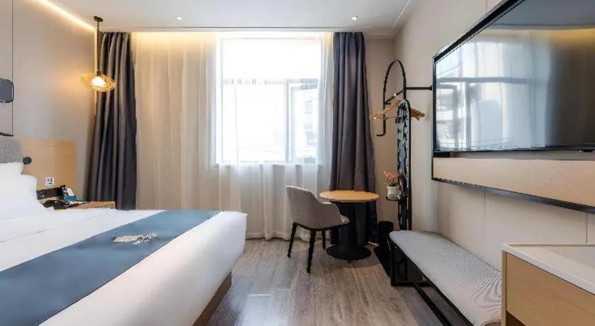 Bed in Echarm Hotel Shanghai North Bund Tilanqiao Metro Station