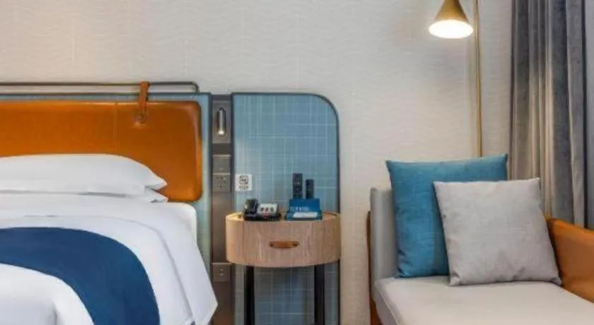 Bed in Echarm Hotel Liuzhou Yaobu Ancient Town