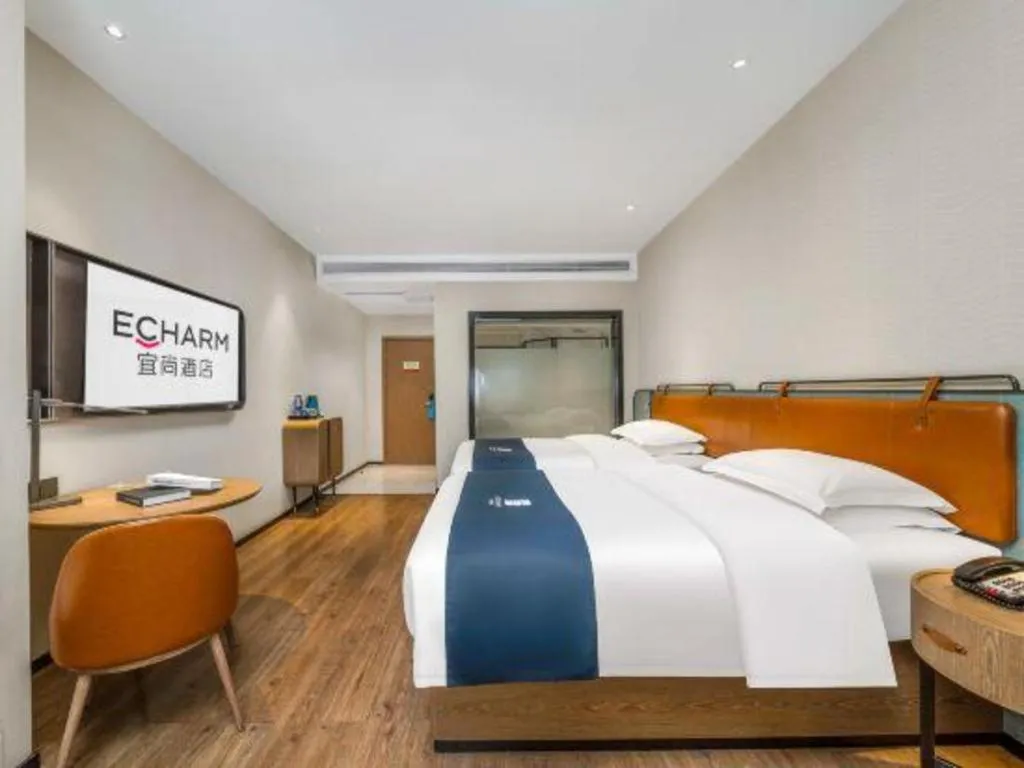 Bed in Echarm Hotel Liuzhou Yaobu Ancient Town