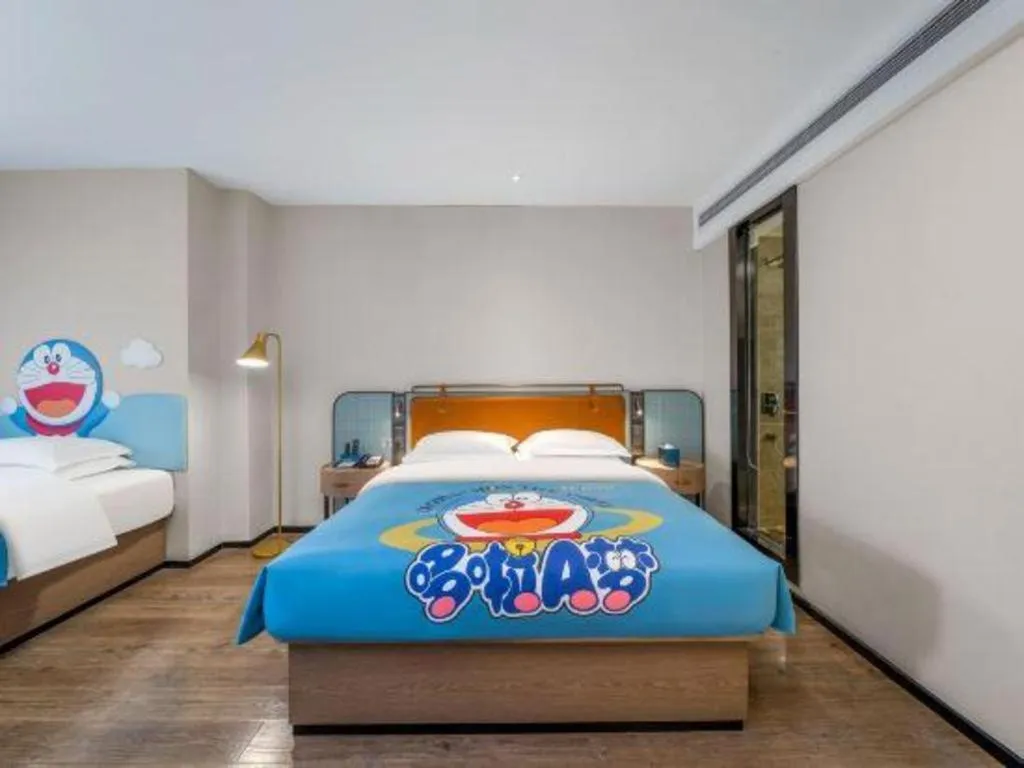 Bed in Echarm Hotel Liuzhou Yaobu Ancient Town