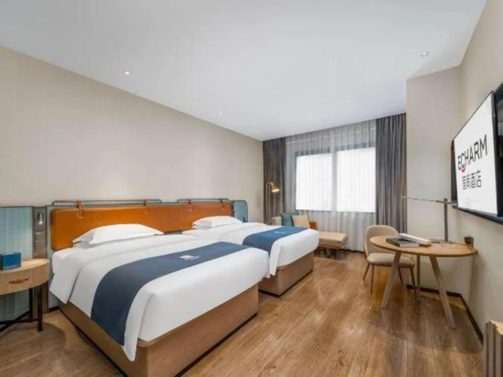 Bed in Echarm Hotel Liuzhou Yaobu Ancient Town