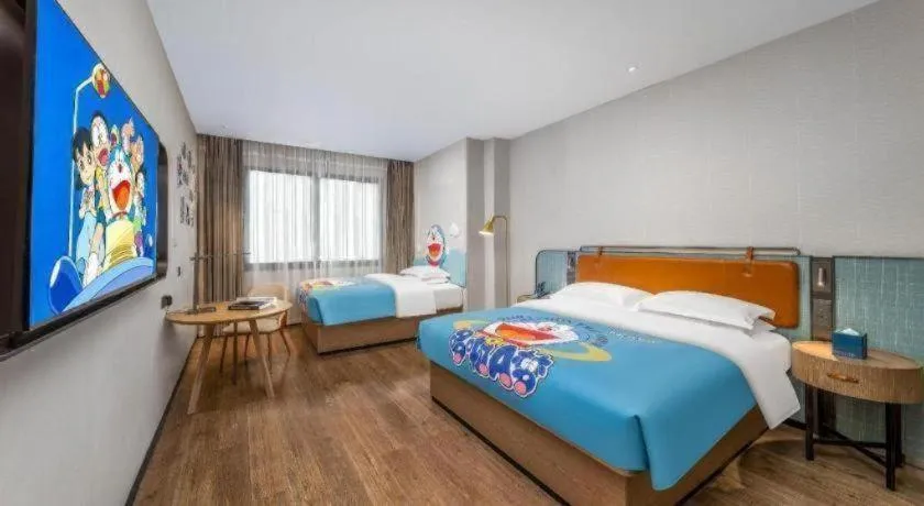 Bed in Echarm Hotel Liuzhou Yaobu Ancient Town