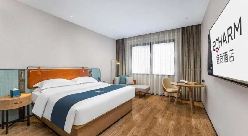 Bed in Echarm Hotel Liuzhou Yaobu Ancient Town