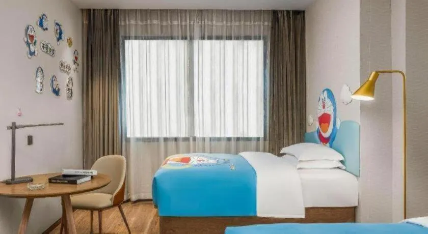 Bed in Echarm Hotel Liuzhou Yaobu Ancient Town