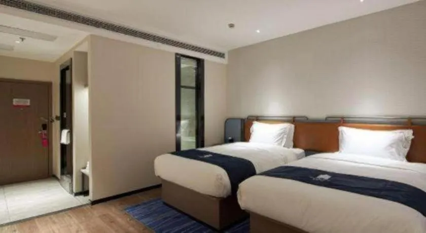 Bed in Echarm Hotel Liuzhou Yaobu Ancient Town
