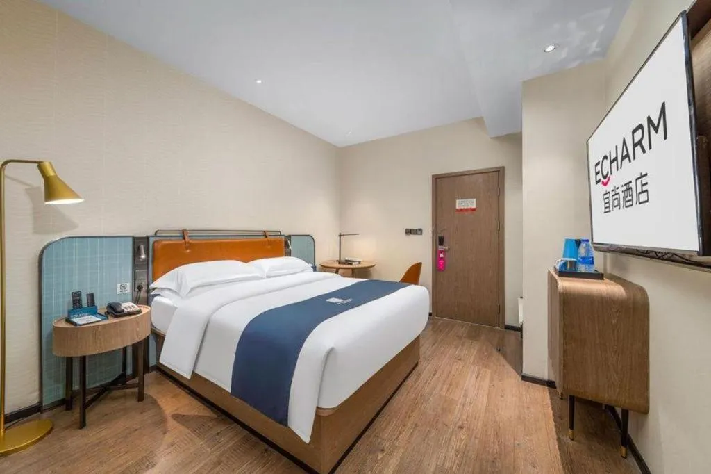 Bed in Echarm Hotel Liuzhou Yaobu Ancient Town