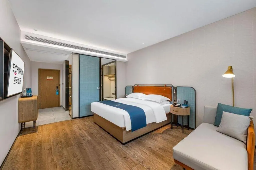 Bed in Echarm Hotel Liuzhou Yaobu Ancient Town