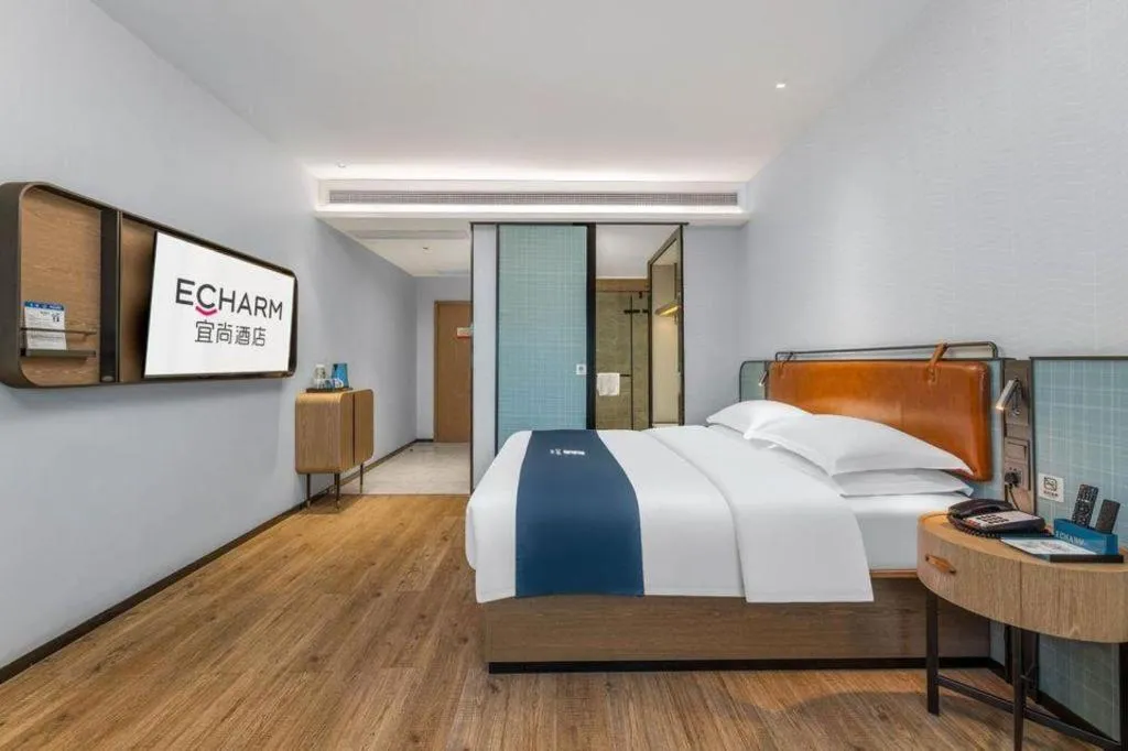 Bed in Echarm Hotel Liuzhou Yaobu Ancient Town