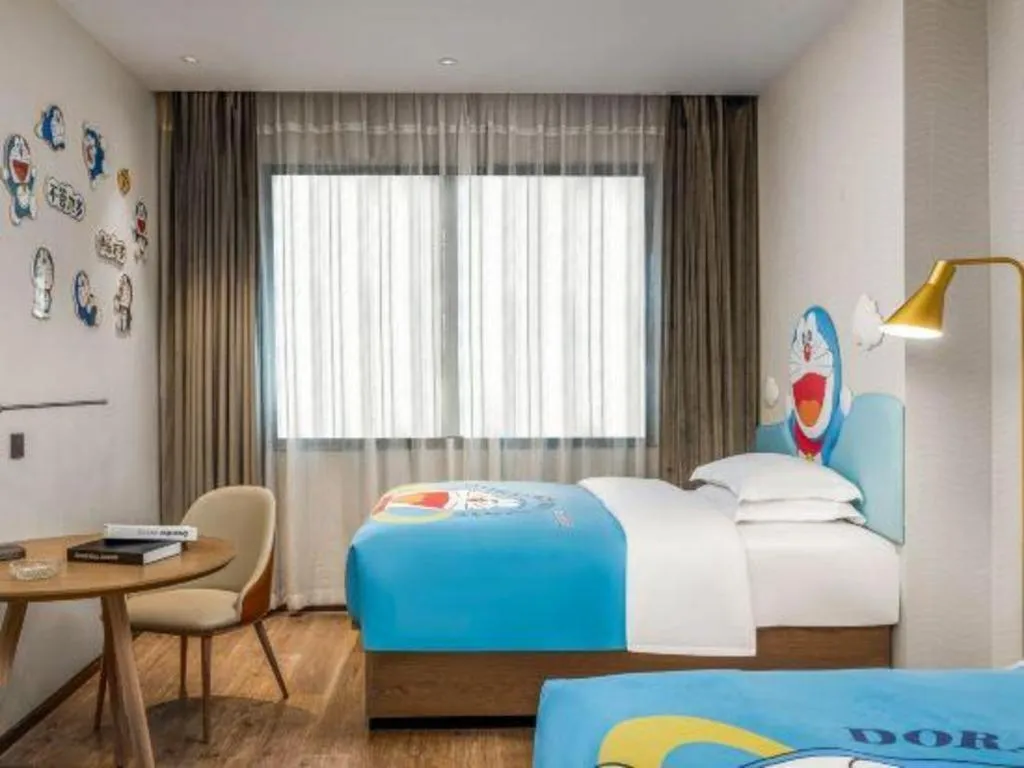 Bed in Echarm Hotel Liuzhou Yaobu Ancient Town